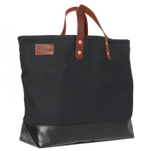 Black canvas tote bag with leather handles
